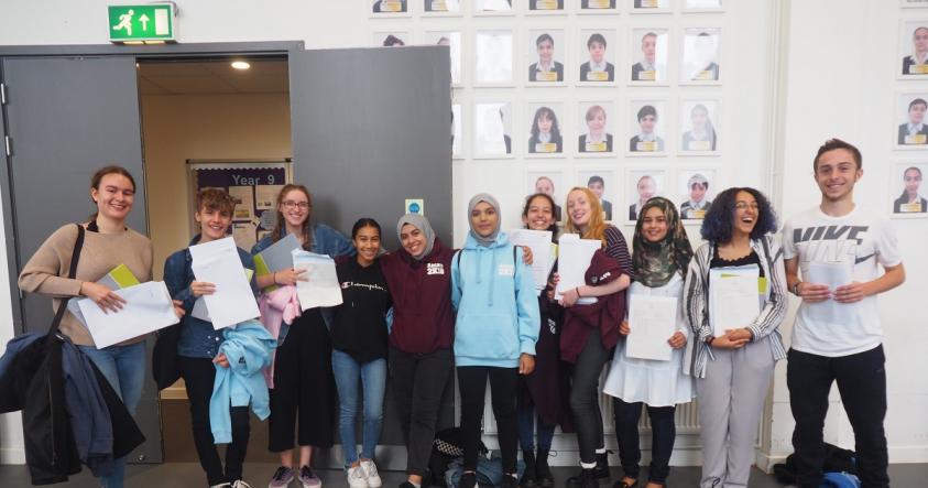 image of students getting exam results