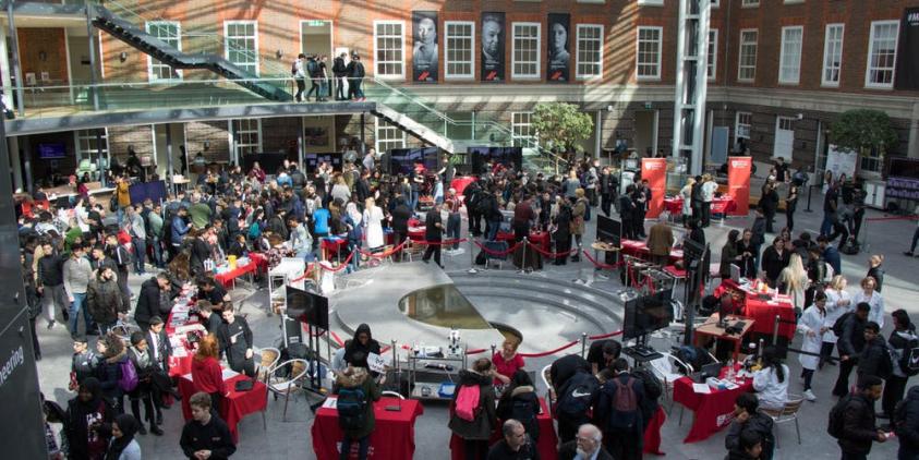 Crowd and cars at Middlesex stem festival
