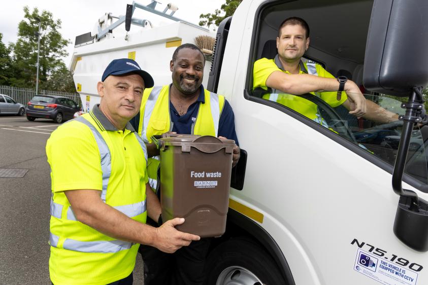 Street scene team with new food waste bin
